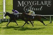 13 September 2020; Shale, left with Ryan Moore up, passes the post ahead of second place Pretty Gorgeous, with Declan McDonogh up, to win the Moyglare Stud Stakes during day two of The Longines Irish Champions Weekend at The Curragh Racecourse in Kildare. Photo by Seb Daly/Sportsfile