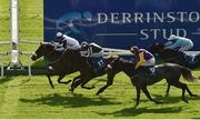 13 September 2020; Jockey Tom Evans celebrates as he passes the post after riding Glass Slippers to victory in the Derrinstown Stud Flying Five Stakes during day two of The Longines Irish Champions Weekend at The Curragh Racecourse in Kildare. Photo by Seb Daly/Sportsfile