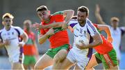 13 September 2020; Shane Horan of Kilmacud Crokes is tackled by Darragh Conlon, left, and Carl Keeley of Ballymun Kickhams during the Dublin County Senior Football Championship Semi-Final match between Ballymun Kickhams and Kilmacud Crokes at Parnell Park in Dublin. Photo by Piaras Ó Mídheach/Sportsfile