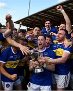 13 September 2020; David Lavery of Maghery Seán MacDiarmada, centre, lifts the cup and celebrates with team-mates following the Armagh County Senior Football Championship Final match between Crossmaglen Rangers and Maghery Seán MacDiarmada at the Athletic Grounds in Armagh. Photo by David Fitzgerald/Sportsfile