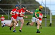 13 September 2020; Phelim Duffin of Dunloy races clear of James McNaughton, left, and Declan mcCloskey of Loughgiel during the Antrim County Senior Hurling Championship Final match between Dunloy Cuchullains and Loughgiel Shamrocks at Páirc Mhic Uilín in Ballycastle, Antrim. Photo by Brendan Moran/Sportsfile