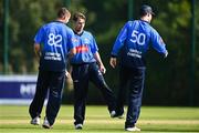 17 September 2020; Curtis Campher of Leinster Lightning celebrates with team-mates Josh Little, left, and George Dockrell after bowling James McCollum of Northern Knights for LBW during the Test Triangle Inter-Provincial 50- Over Series 2020 match between Leinster Lightning and Northern Knights at Comber in Down. Photo by Sam Barnes/Sportsfile