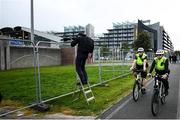 17 September 2020; A photographer takes photos from outside the ground during the UEFA Europa League Second Qualifying Round match between Shamrock Rovers and AC Milan at Tallaght Stadium in Dublin. Photo by David Fitzgerald/Sportsfile