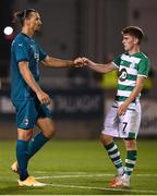 17 September 2020; Zlatan Ibrahimovic of AC Milan and Dylan Watts of Shamrock Rovers following the UEFA Europa League Second Qualifying Round match between Shamrock Rovers and AC Milan at Tallaght Stadium in Dublin. Photo by Stephen McCarthy/Sportsfile