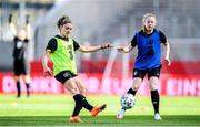 18 September 2020; Leanne Kiernan, left, challenges for the ball with Amber Barrett during a Republic of Ireland women's training session at Stadion Essen in Essen, Germany. Photo by Lukas Schulze/Sportsfile