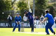 19 September 2020; Simi Singh of YMCA plays a shot watched by Billy Dougherty of Donemana during the All-Ireland T20 Cup Final match between YMCA and  Donemana at CIYMS Cricket Club in Belfast. Photo by Sam Barnes/Sportsfile
