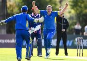 19 September 2020; Jordan McGonigle of Donemana, centre, celebrates with Billy Dougherty after the pair combined to take the wicket of Simi Singh of YMCA during the All-Ireland T20 Cup Final match between YMCA and  Donemana at CIYMS Cricket Club in Belfast. Photo by Sam Barnes/Sportsfile