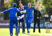 19 September 2020; Jordan McGonigle of Donemana, centre, celebrates with Billy Dougherty after the pair combined to take the wicket of Simi Singh of YMCA during the All-Ireland T20 Cup Final match between YMCA and  Donemana at CIYMS Cricket Club in Belfast. Photo by Sam Barnes/Sportsfile