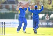 19 September 2020; Jordan McGonigle of Donemana, left, celebrates with team-mate Billy Dougherty after the pair combined to take the wicket of Jack Tector of YMCA during the All-Ireland T20 Cup Final match between YMCA and Donemana at CIYMS Cricket Club in Belfast. Photo by Sam Barnes/Sportsfile