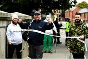 19 September 2020; Laura Shearer and her husband Ricky hold a tape as her dad and former international athlete Frank Greally, who fifty years ago set a 10,000 metres National Junior record of 30:17, at the finish of 'Gratitude Road', a walk from Ballyhaunis in Mayo, via the Coombe Women & Infants University Hospital, and back to The Old Coombe Hospital site on The Coombe in Dublin. Photo by Ray McManus/Sportsfile