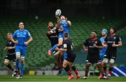19 September 2020; Jordan Larmour of Leinster and Billy Vunipola of Saracens compete for a high ball during the Heineken Champions Cup Quarter-Final match between Leinster and Saracens at the Aviva Stadium in Dublin. Photo by Ramsey Cardy/Sportsfile