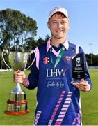 19 September 2020; Jack Tector of YMCA is pictured with the cup and his player of the match award following the All-Ireland T20 Cup Final match between YMCA and Donemana at CIYMS Cricket Club in Belfast. Photo by Sam Barnes/Sportsfile