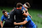 19 September 2020; Ryan Baird of Leinster is tackled by Michael Rhodes and Jamie George of Saracens during the Heineken Champions Cup Quarter-Final match between Leinster and Saracens at the Aviva Stadium in Dublin. Photo by Brendan Moran/Sportsfile