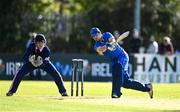 19 September 2020; William McBrine of Donemana plays a shot watched by JJ Cassidy of YMCA during the All-Ireland T20 Cup Final match between YMCA and Donemana at CIYMS Cricket Club in Belfast. Photo by Sam Barnes/Sportsfile