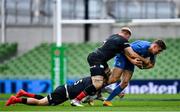 19 September 2020; Garry Ringrose of Leinster is tackled by Elliot Daly and Jackson Wray of Saracens during the Heineken Champions Cup Quarter-Final match between Leinster and Saracens at the Aviva Stadium in Dublin. Photo by Brendan Moran/Sportsfile