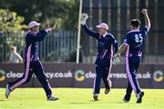 19 September 2020; JJ Cassidy of YMCA, centre, celebrates with team-mates after catching out William McClintock of Donemana during the All-Ireland T20 Cup Final match between YMCA and Donemana at CIYMS Cricket Club in Belfast. Photo by Sam Barnes/Sportsfile