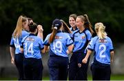 20 September 2020; Orla Prendergast of Typhoons, second from right, is congratulated by team-mates after bowling out Tess Maritz of Scorchers during the Women's Super Series match between Typhoons and Scorchers at Merrion Cricket Club in Dublin. Photo by Seb Daly/Sportsfile