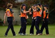 20 September 2020; Tess Maritz of Scorchers, second from left, is congratulated by team-mates after catching Rebecca Stokell of Typhoons during the Women's Super Series match between Typhoons and Scorchers at Merrion Cricket Club in Dublin. Photo by Seb Daly/Sportsfile