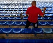 20 September 2020; Slawomir, an employee of Ryan's Cleaning, cleans the seats before the Tipperary County Senior Hurling Championship Final match between Kiladangan and Loughmore-Castleiney at Semple Stadium in Thurles, Tipperary. Photo by Ray McManus/Sportsfile