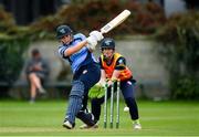 20 September 2020; Rebecca Stokell of Typhoons plays a shot, watched by Scorchers' wicket-keeper Shauna Kavanagh, during the Women's Super Series match between Typhoons and Scorchers at Merrion Cricket Club in Dublin. Photo by Seb Daly/Sportsfile