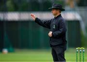 20 September 2020; Umpire Paul Reynolds signals a boundary during the Women's Super Series match between Typhoons and Scorchers at Merrion Cricket Club in Dublin. Photo by Seb Daly/Sportsfile