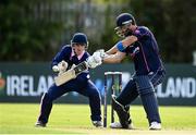 20 September 2020; Nigel Jones of CIYMS plays a shot watched by JJ Cassidy of YMCA during the All-Ireland T20 European Cricket League Play-Off match between CIYMS and YMCA at CIYMS Cricket Club in Belfast. Photo by Sam Barnes/Sportsfile