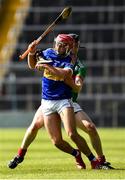 20 September 2020; Decky McGrath of Kiladangan is tackled by Joesph Nyland of Loughmore-Castleiney during the Tipperary County Senior Hurling Championship Final match between Kiladangan and Loughmore-Castleiney at Semple Stadium in Thurles, Tipperary. Photo by Ray McManus/Sportsfile
