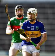 20 September 2020; Paul Flynn of Kiladangan in action against Lorcan Egan of Loughmore-Castleiney during the Tipperary County Senior Hurling Championship Final match between Kiladangan and Loughmore-Castleiney at Semple Stadium in Thurles, Tipperary. Photo by Ray McManus/Sportsfile
