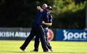 20 September 2020; James Cameron-Dow of CIYMS, left, is congratulated by team-mate John Matchett after completing a hat-trick in the games final over during the All-Ireland T20 European Cricket League Play-Off match between CIYMS and YMCA at CIYMS Cricket Club in Belfast. Photo by Sam Barnes/Sportsfile