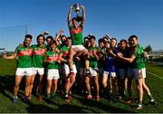 20 September 2020; St Brigids captain Ronan Stack lifts the trophy with team-mates following the Roscommon County Senior Football Championship Final match between Padraig Pearses and St Brigids at Dr Hyde Park in Roscommon.  Photo by Harry Murphy/Sportsfile