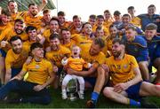 20 September 2020; Éila Kilcoyne, age 1, celebrates with the Knockmore players following the Mayo County Senior Football Championship Final match between Breaffy and Knockmore at Elvery's MacHale Park in Castlebar, Mayo.  Photo by Eóin Noonan/Sportsfile