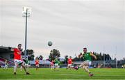 20 September 2020; Kiefer Morgan of Dungannon Thomas Clarkes kicks at goal under pressure from Gavin McCarron of Trillick St. Macartan’s during the Tyrone County Senior Football Championship Final match between Trillick St. Macartan’s and Dungannon Thomas Clarkes at Healy Park in Omagh, Tyrone. Photo by Ramsey Cardy/Sportsfile