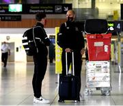 22 September 2020; Dundalk goalkeeper Gary Rogers, right, and Darragh Walsh, son of Dundalk kitman Noel Walsh, at Dublin Airport as Dundalk depart for their Europa League third qualifying round match against Sheriff in Tiraspol, Moldova. Photo by Matt Browne/Sportsfile