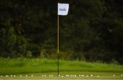 22 September 2020; A flagstick and golf balls are seen on the practice range ahead of the Dubai Duty Free Irish Open Golf Championship at Galgorm Spa & Golf Resort in Ballymena, Antrim. Photo by Brendan Moran/Sportsfile