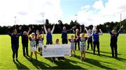 23 September 2020; Skryne GFC has been boosted with the news that it has claimed first prize in the 2020 Kellogg’s GAA Cúl Camps on-pack promotion, claiming a huge €25,000 for the club. Pictured is David Byrne from Kellogg’s with Skryne GFC members, from left, Madonna Purcell, Senan McGrath, Oisin Giles, Emily Philips, Brenda McGovern, Trevor Giles, Damien Sheridan, Chris O’Connor, Katie O’Connor, Brendan Canavan, Christy O'Connor, Ross Philips and Fionnula Smyth. Photo by Matt Browne/Sportsfile