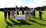 23 September 2020; Skryne GFC has been boosted with the news that it has claimed first prize in the 2020 Kellogg’s GAA Cúl Camps on-pack promotion, claiming a huge €25,000 for the club. Pictured is David Byrne from Kellogg’s with Skryne GFC members, from left, Madonna Purcell, Senan McGrath, Oisin Giles, Emily Philips, Brenda McGovern, Trevor Giles, Damien Sheridan, Chris O’Connor, Katie O’Connor, Brendan Canavan, Christy O'Connor, Ross Philips and Fionnula Smyth. Photo by Matt Browne/Sportsfile