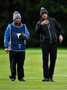 24 September 2020; Dean Burmester of South Africa checks the yardage with his caddie Jason Reynolds during day one of the Dubai Duty Free Irish Open Golf Championship at Galgorm Spa & Golf Resort in Ballymena, Antrim. Photo by Brendan Moran/Sportsfile