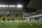24 September 2020; Dundalk players warm-up prior to the UEFA Europa League Third Qualifying Round match between FC Sheriff Tiraspol and Dundalk at the Stadionul Sheriff in Tiraspol, Moldova. Photo by Alex Nicodim/Sportsfile