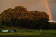 24 September 2020; Aaron Rai of England putts on the 18th green under a rainbow during day one of the Dubai Duty Free Irish Open Golf Championship at Galgorm Spa & Golf Resort in Ballymena, Antrim. Photo by Brendan Moran/Sportsfile