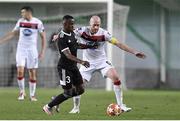 24 September 2020; Charles Petro of FC Sheriff Tiraspol in action against Chris Shields Dundalk during the UEFA Europa League Third Qualifying Round match between FC Sheriff Tiraspol and Dundalk at the Stadionul Sheriff in Tiraspol, Moldova. Photo by Alex Nicodim/Sportsfile