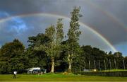 25 September 2020; A rainbow is seen as Marc Warren of Scotland practices on the putting green while play is delayed on day two of the Dubai Duty Free Irish Open Golf Championship at Galgorm Spa & Golf Resort in Ballymena, Antrim. Photo by Brendan Moran/Sportsfile