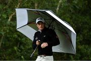 25 September 2020; Paul Dunne of Ireland shelters from heavy rainfall on the second tee box during day two of the Dubai Duty Free Irish Open Golf Championship at Galgorm Spa & Golf Resort in Ballymena, Antrim. Photo by Brendan Moran/Sportsfile