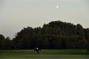 25 September 2020; George Coetzee of South Africa lines up a putt under a rising moon and fading light at the end of their second round during day two of the Dubai Duty Free Irish Open Golf Championship at Galgorm Spa & Golf Resort in Ballymena, Antrim. Photo by Brendan Moran/Sportsfile
