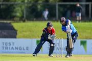 26 September 2020; Lorcan Tucker of Leinster Lightning plays a shot watched by Gary Wilson of Northern Knights during the Test Triangle Inter-Provincial Series 50 over match between Leinster Lightning and Northern Knights at Malahide Cricket Club in Dublin. Photo by Sam Barnes/Sportsfile