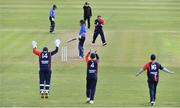 26 September 2020; Mark Adair of Northern Knights, and team-mates, from left, Gary Wilson, Neil Rock and Ruan Pretorius celebrate after Kevin O'Brien of Leinster Lightning is bowled LBW during the Test Triangle Inter-Provincial Series 50 over match between Leinster Lightning and Northern Knights at Malahide Cricket Club in Dublin. Photo by Sam Barnes/Sportsfile