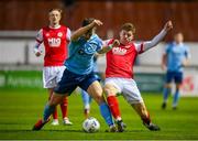 26 September 2020; Rory Feely of St Patrick's Athletic in action against Aaron Dobbs of Shelbourne during the SSE Airtricity League Premier Division match between St Patrick's Athletic and Shelbourne at Richmond Park in Dublin. Photo by Stephen McCarthy/Sportsfile