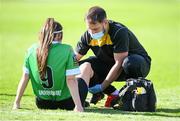 26 September 2020; Alannah McEvoy of Peamount United is attended to by physiotherapist Aaron Fattore during the Women's National League match between Shelbourne and Peamount at Tolka Park in Dublin. Photo by Stephen McCarthy/Sportsfile