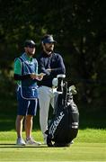 27 September 2020; Antoine Rozner of France, right, with his caddie Darren Reynolds, considers his options on the fourth fairway during day four of the Dubai Duty Free Irish Open Golf Championship at Galgorm Spa & Golf Resort in Ballymena, Antrim. Photo by Brendan Moran/Sportsfile