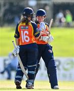 27 September 2020; Leah Paul, left, and Jenny Sparrow of Scorchers bump fists during the Women's Super Series match between Scorchers and Typhoons at Malahide Cricket Club in Dublin. Photo by Sam Barnes/Sportsfile
