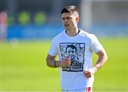 27 September 2020; Conor Mullally of Cuala wearing a t-shirt in the warm-up in support of his team-mate Seán Drummond, who was injured in an accident last year, before the Dublin County Senior 2 Football Championship Final match between Cuala and St Brigid's at Parnell Park in Dublin. Photo by Piaras Ó Mídheach/Sportsfile